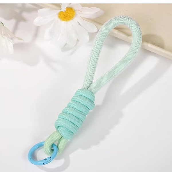 Stylishly designed necklace that attaches to the phone, with a plastic part to secure it to the phone