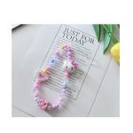 Stylishly designed necklace that attaches to the phone, with a plastic part to secure it to the phone