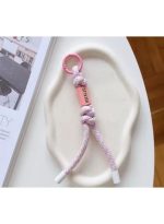 Wrist strap to hold the phone, fits all smartphones. Comes with a plastic piece to attach to the phone.