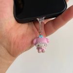 Stylishly designed medallion that attaches to the phone, with a plastic part to secure it to the phone