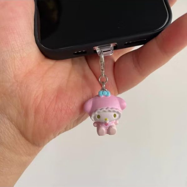 Stylishly designed medallion that attaches to the phone, with a plastic part to secure it to the phone